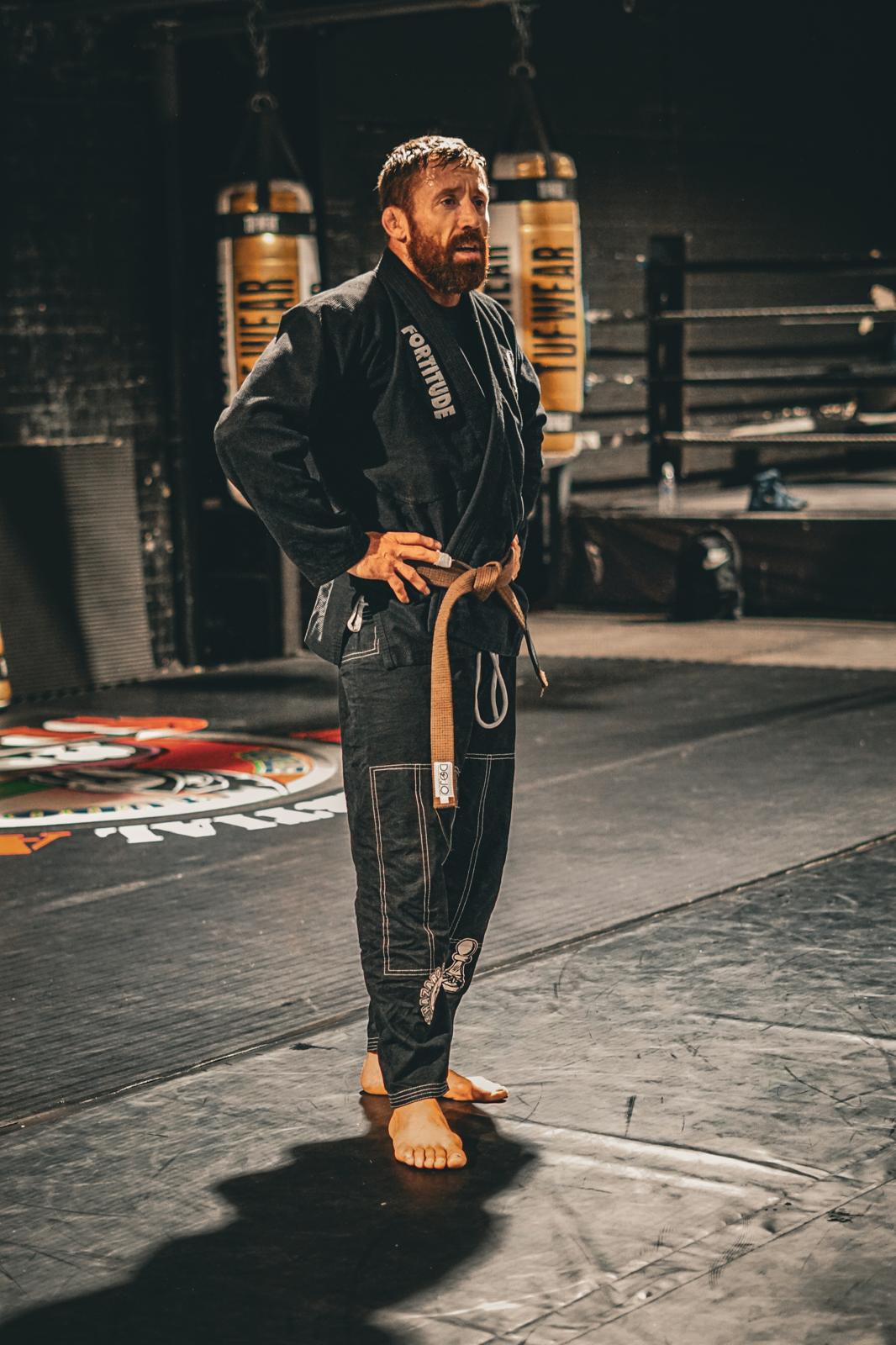 Head Coach Gary Oliver, founder of Fortitude BJJ, in a gi